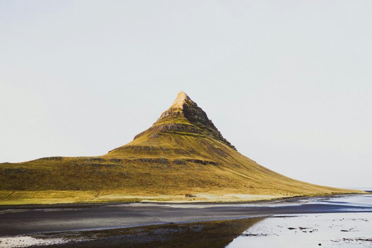 Discover the breathtaking Kirkjufell Mountain in Iceland's serene landscape, perfect for nature lovers.